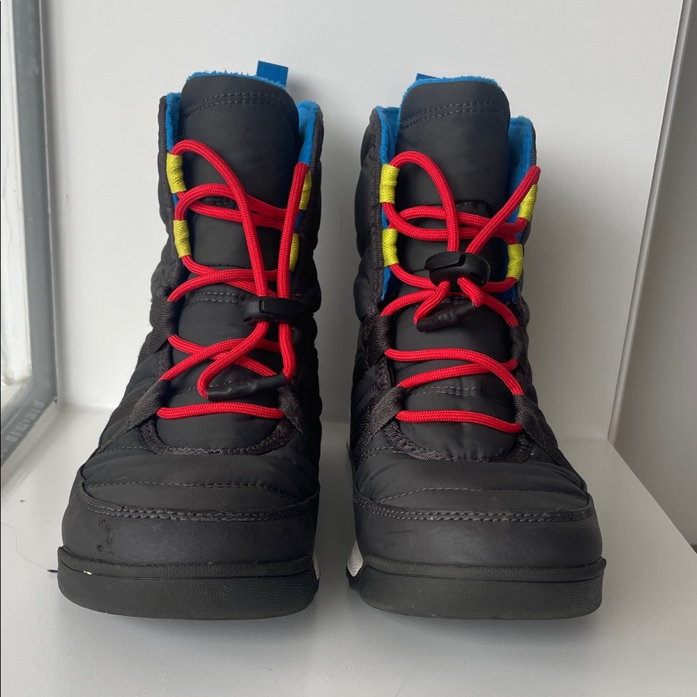 Sorel Kids Black Boots with Red and Blue Accents